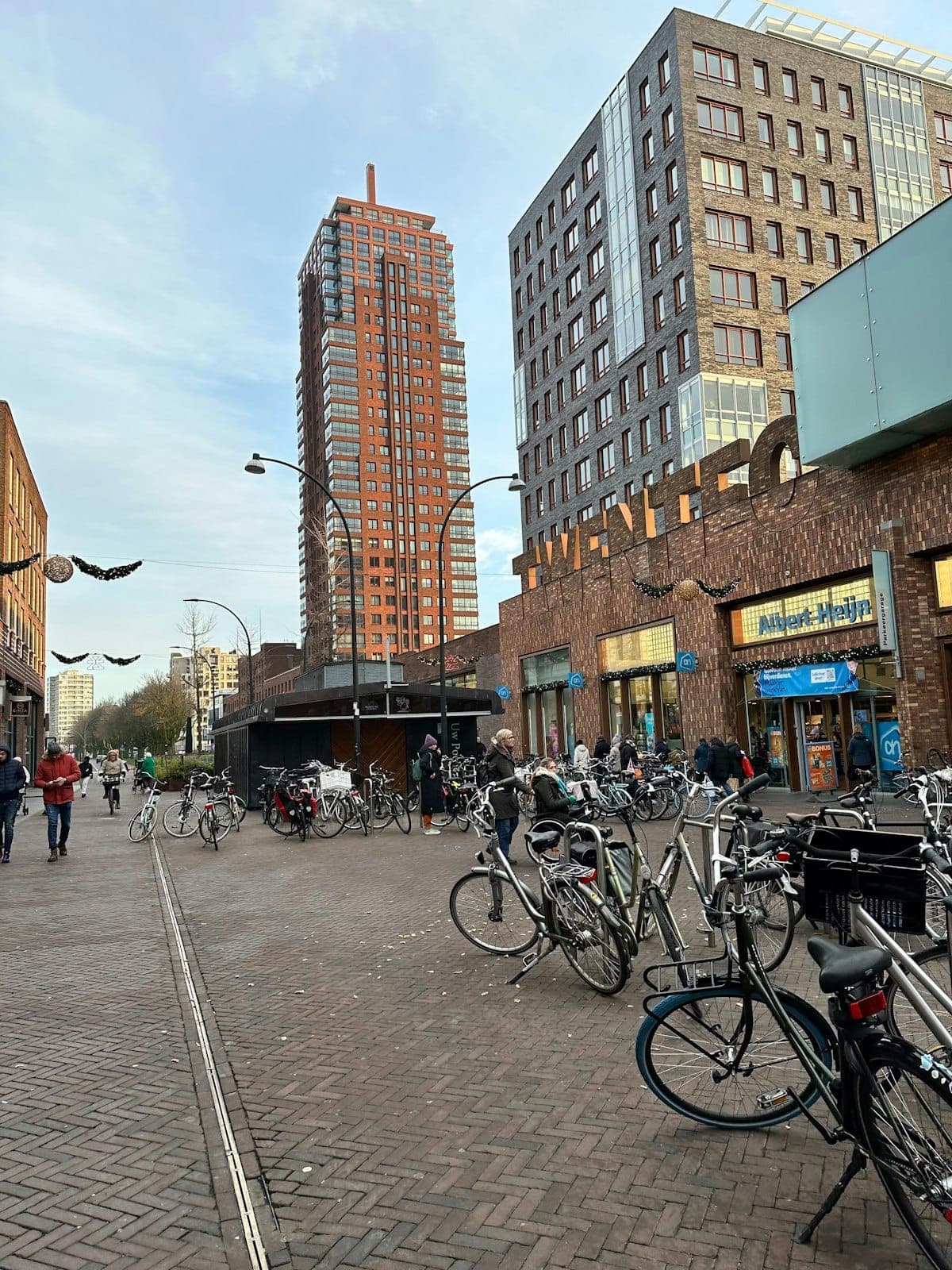Bicycles and shops on a street in Enschede